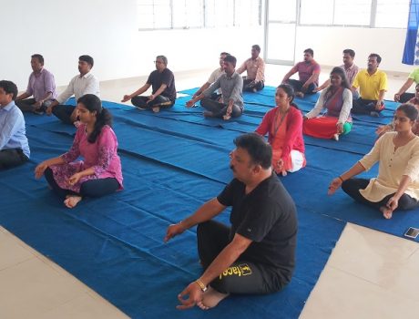 faculty and staff members participated in Yoga Day